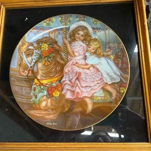 The carousel, china plate, framed